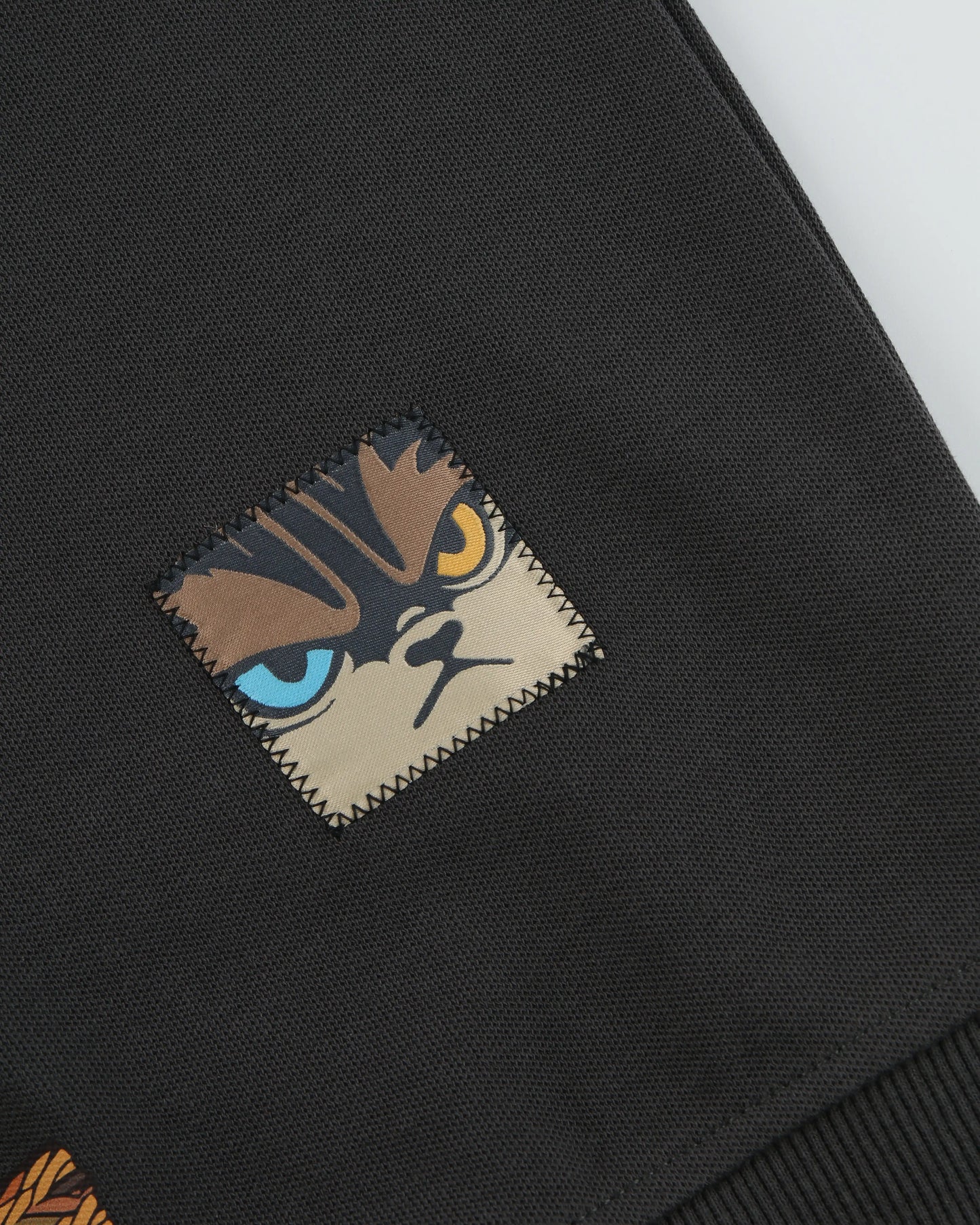 WEAVING LOGO FRONT POCKET OVERSIZED POLO SHIRT